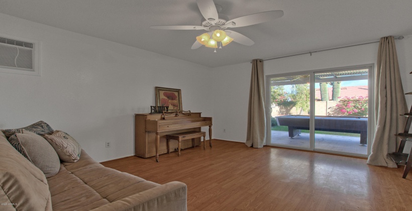 Bonus room opens to your own personal backyard oasis