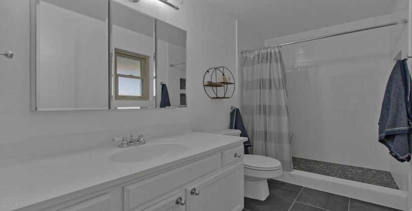 Owner's remodeled ensuite with walk-in shower