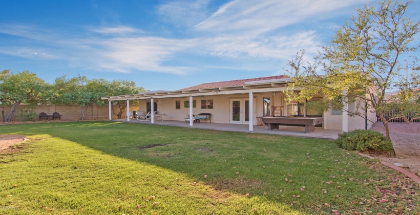 Entertainer's dream backyard; enjoy a game of pool, darts, horse shoes, croquet, gardening, chat by the fire, conversation one of the mutliple conversation areas aroung the yard.