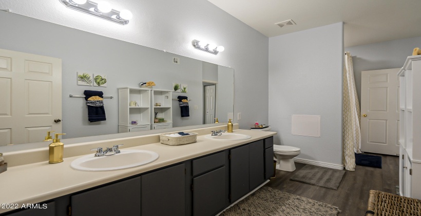 large and spacious bathroom with two sinks