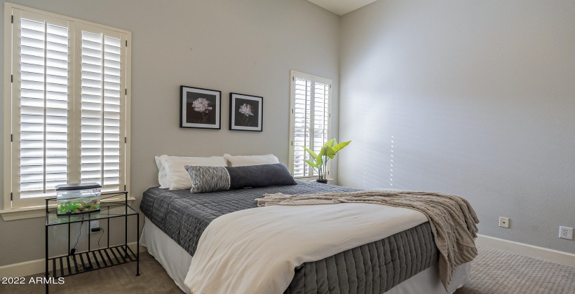 Bedroom 2 (Main Level) has an ensuite bath.