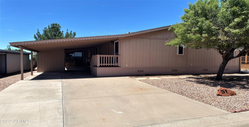 Two car side by side parking and a third under carport