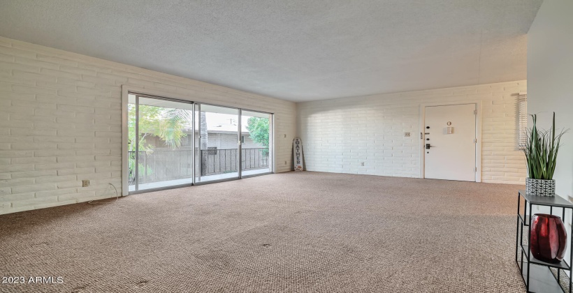 Extended length sliding glass doors let in tons of natural light