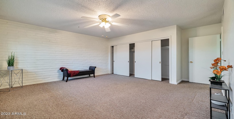 Primary bedroom with extended length closet