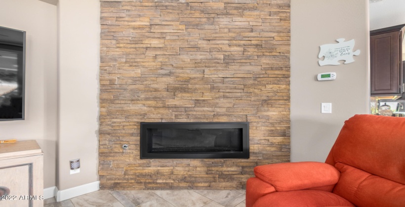 Stacked stone gas fireplace