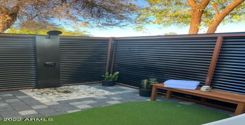 Private outdoor shower outside master bedroom.