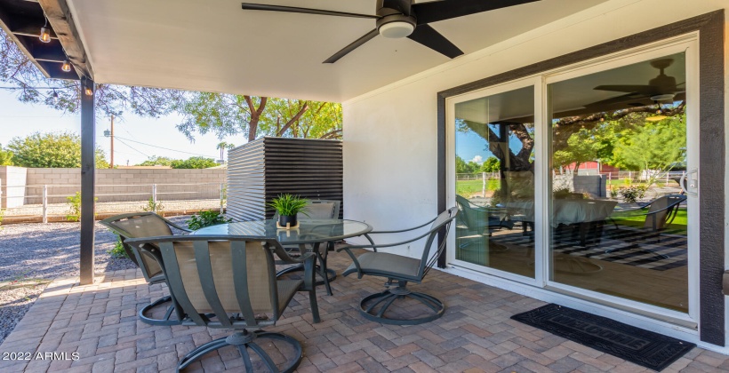 Sliding glass door off master bath leads to spacious backyard.